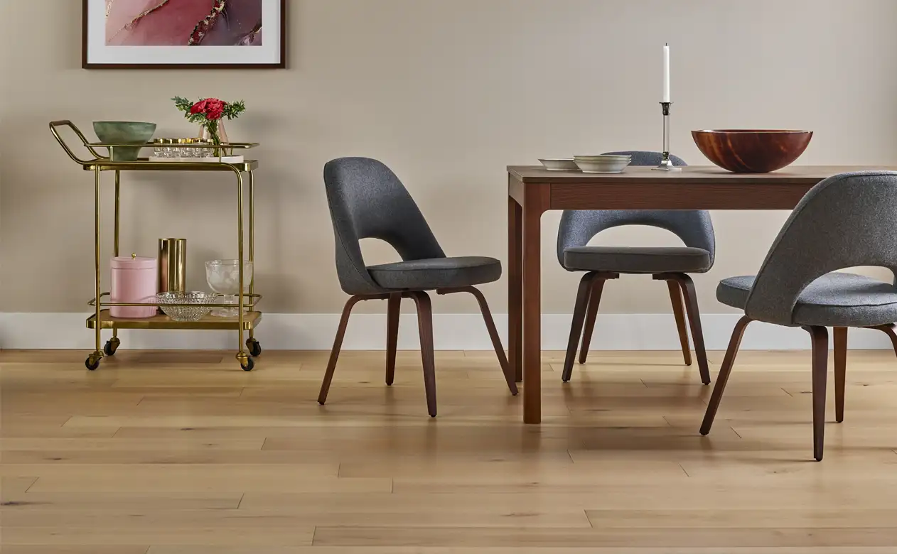 dining room with light toned hardwood flooring